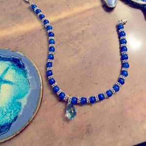 Pretty ankle bracelet. Blue & silver beads w/ a screw clasp and crystal pendant.